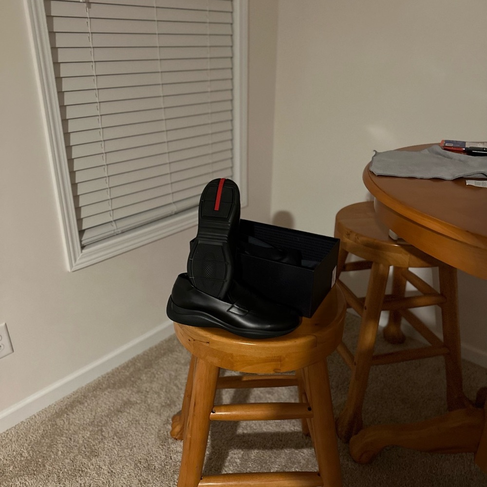 Brand new pair of Prada penny loafers